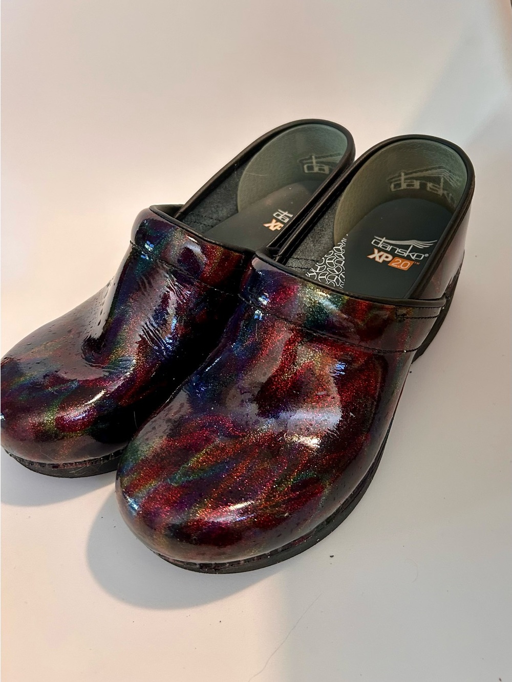Dansko non-slip Multicolor Patent Shimmer Clogs - Picture 1 of 4